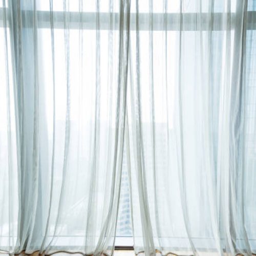 White curtain hanging in the window